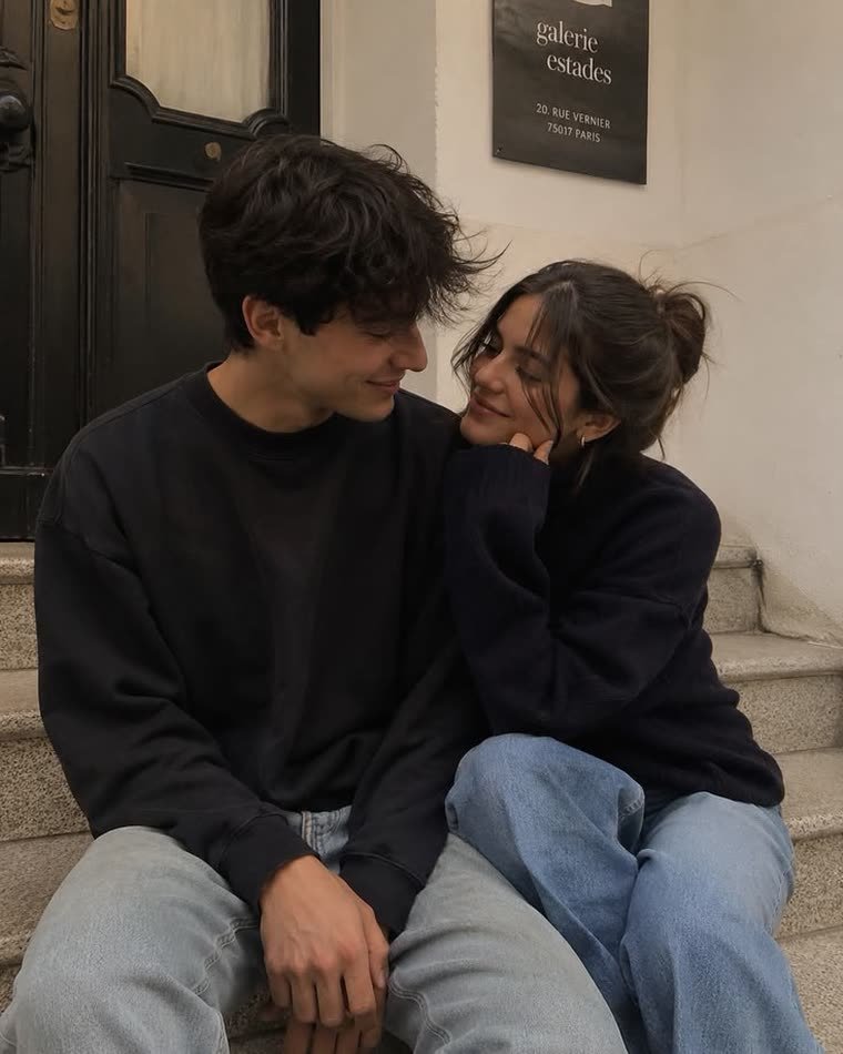 Arjun and Kiara sitting together on a doorstep